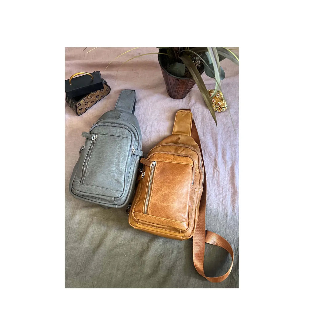 Cowhide Leather Sling Bag – Multi‑Pocket Compact Crossbody with Adjustable Strap